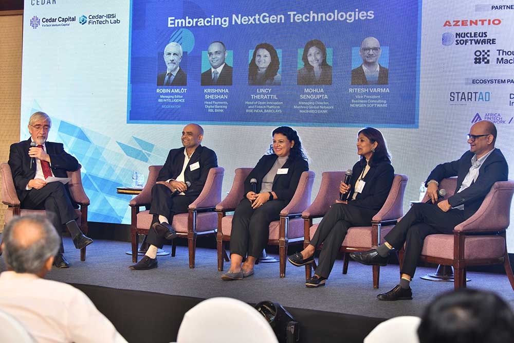 Robin Amlot (Editor in chief at IBSi) moderating the panel on "Embracing NextGen Technologies" with guests Krishnha Sheshan (RBL Bank), Lincy Therattil (Barclays), Mohua Sengupta (Mashreq Bank), and Ritesh Verma (NewGen Software)